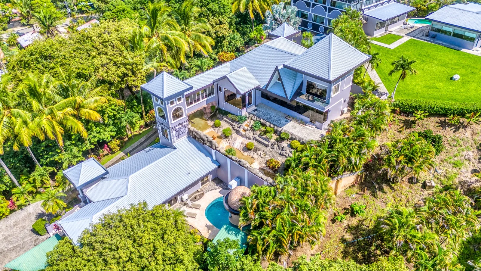 Aerial view over the villas and dome pool