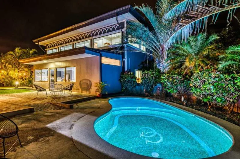Shared pool at Castillo Colonial Nosara at night