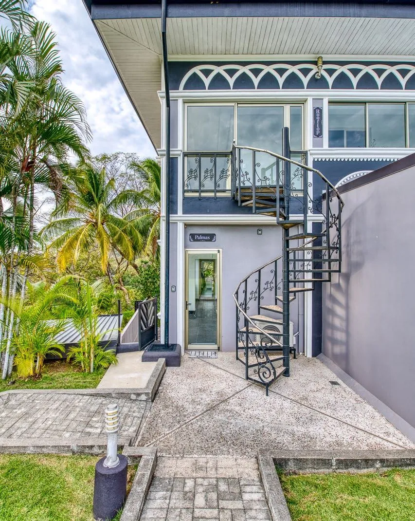 Rooftop villa exterior spiral staircase