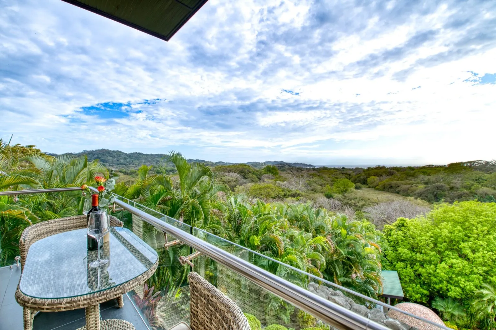 Private balcony at Sunset Tower with jungle and ocean views