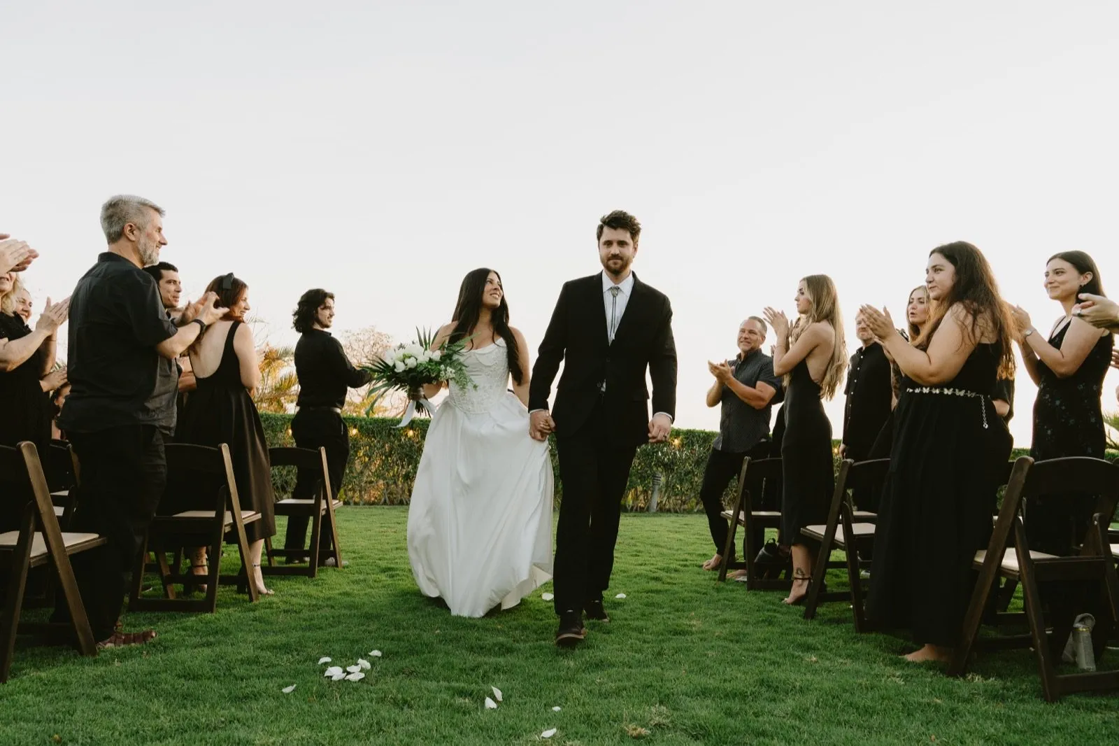Newlyweds walking back down the aisle