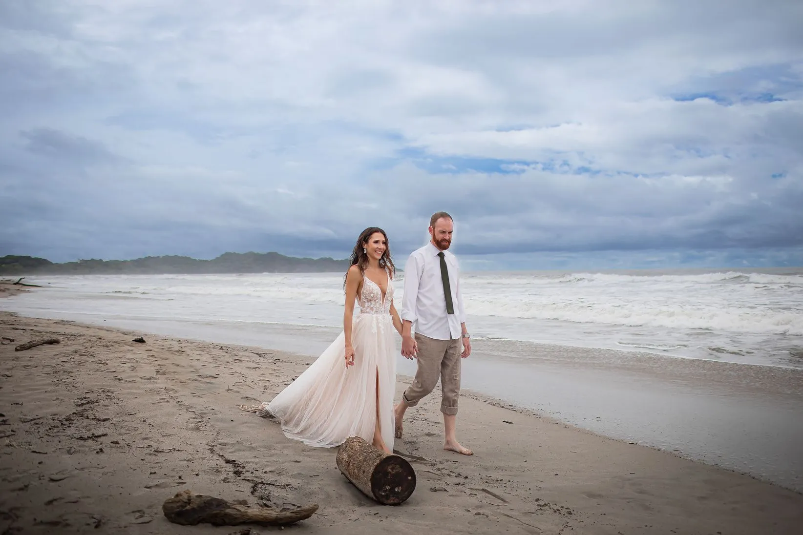 A couple on Playa Guiones after their wedding